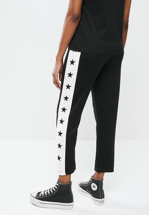 Converse - Star print tapered pant black multi