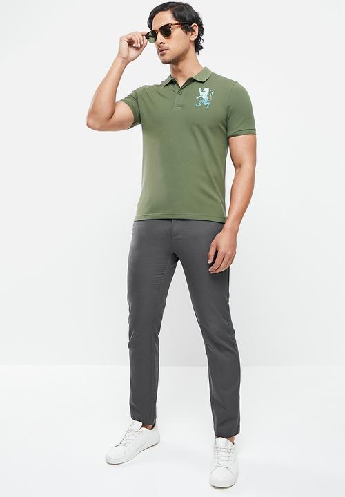 Giordano - 3d lion embriod golfer - green