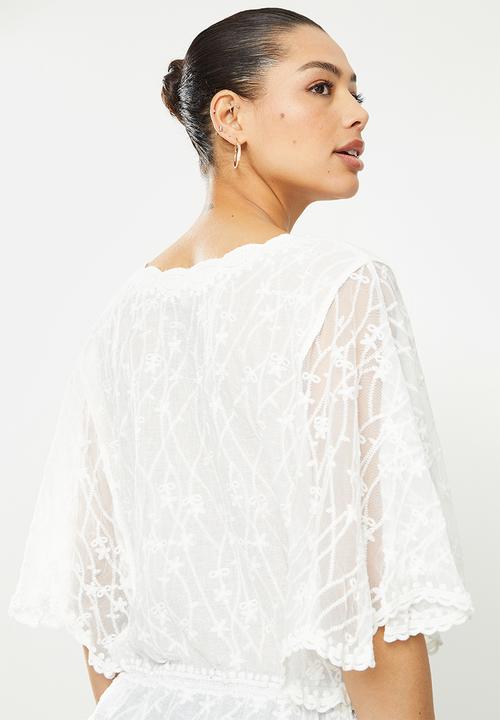 Revenge - 3/4 Batwing sleeve sheer lace blouse - white