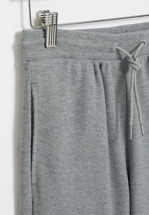 PUMA - Boys pique short - medium gray heather