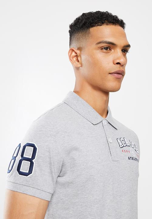 Aca Joe - Chest emb applique short sleeve golfer - grey melange