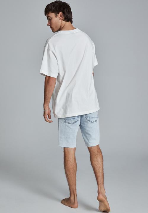 Cotton On - Straight short - stone blue rip repair