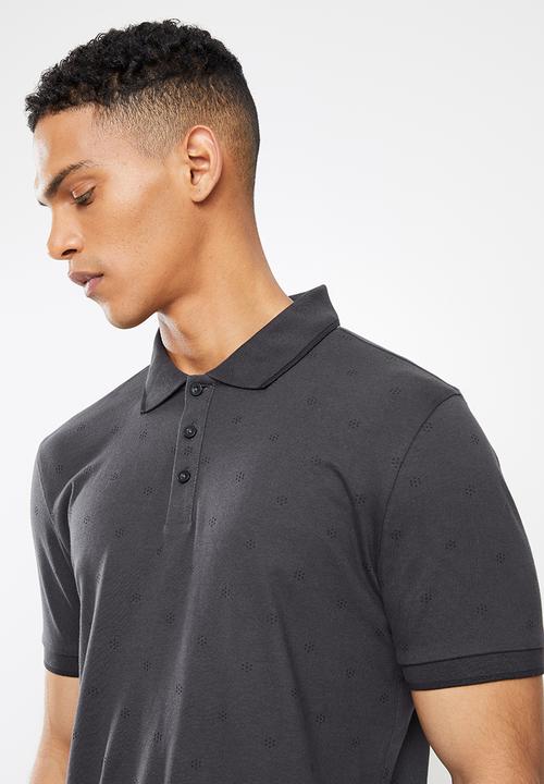 GUESS - Guess all over dot short sleeve golfer - phantom