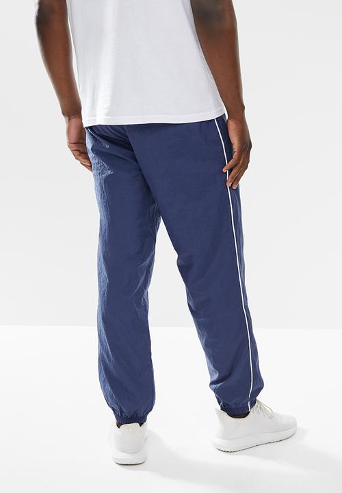 adidas Originals - FAVORITES TRACK PANTS Woven - blue 