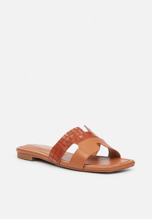 Miss Black - Euphoria1 slide - tan