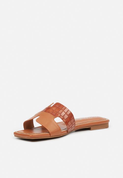 Miss Black - Euphoria1 slide - tan