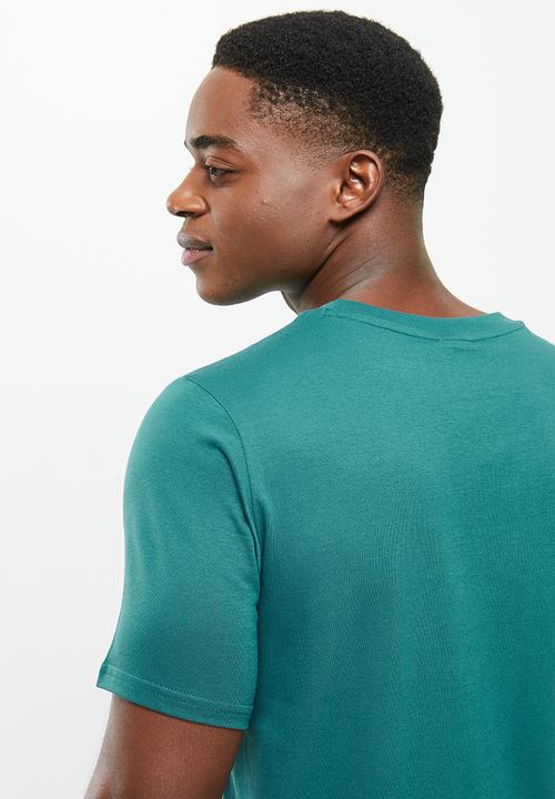 New Balance  - Nb athletics higher learning logo tee - mountain teal