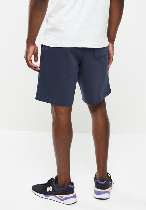 New Balance  - Nb essentials athletic club fleece short - eclipse