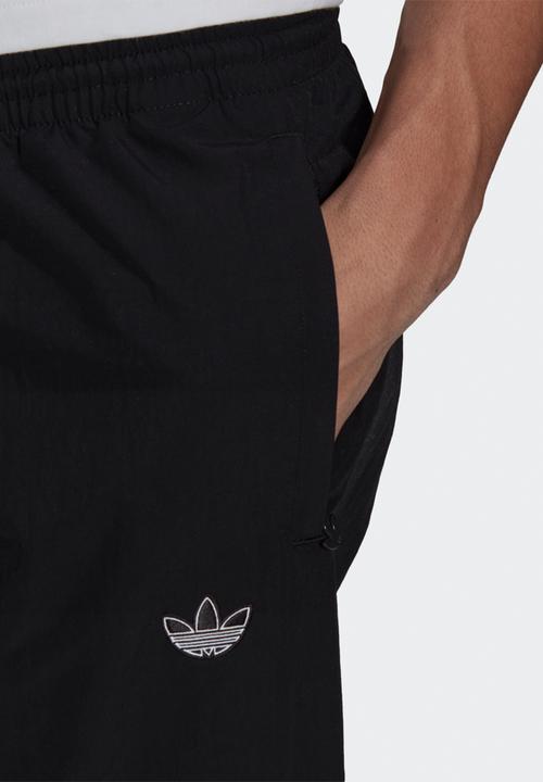 adidas Originals - ADIDAS SPRT ANIMAL PRINT SHARK WOVEN TRACK PANTS    - black & brown 