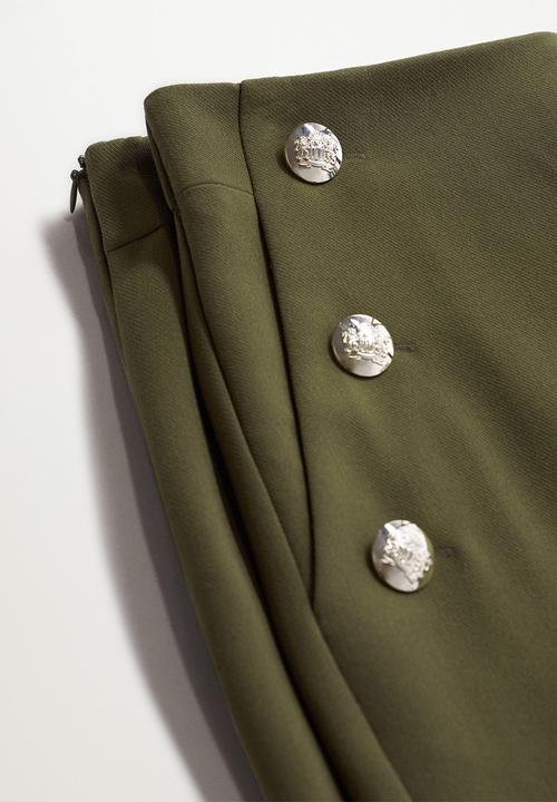 MANGO - Trousers dorado - green