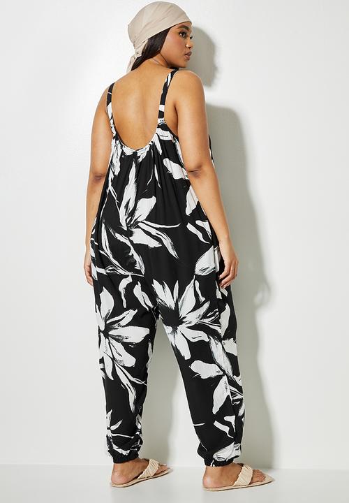 Superbalist - Easy fitting jumpsuit - black ground white flower