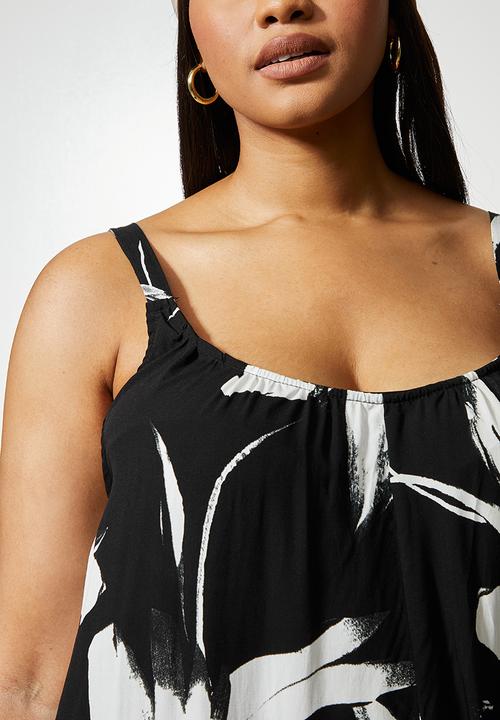 Superbalist - Easy fitting jumpsuit - black ground white flower
