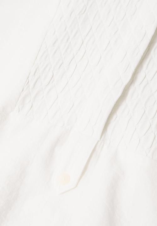 MANGO - Blouse solemne - natural