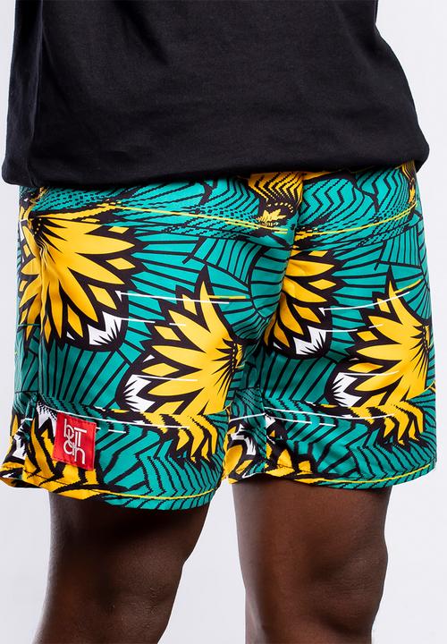 Butan - Protea wax football shorts - green & yellow
