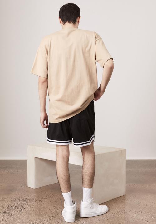 Factorie - Premium oversized graphic T- shirt - almond/unified multi print