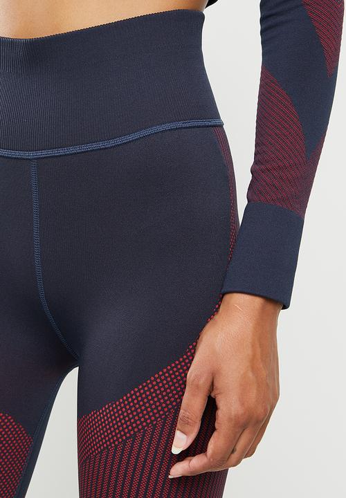 PUMA - Train seamless high waisted 7/8 tights - sunblaze