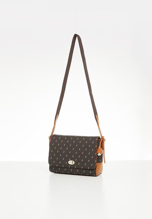 POLO - Iconic flapover sling - brown