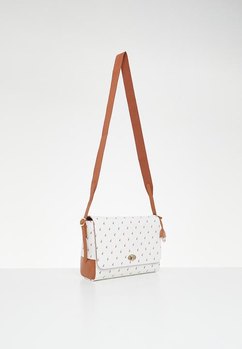 POLO - Iconic flapover sling - white