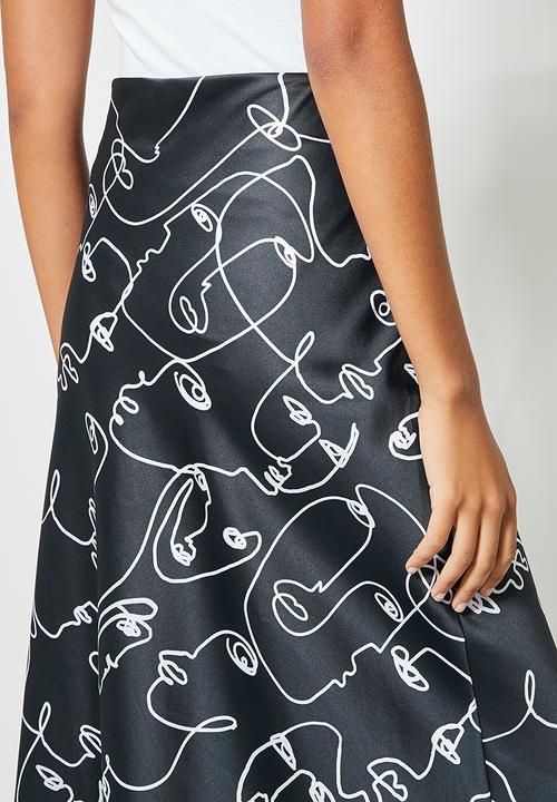 Superbalist - Long midi slip skirt - dark ground doodle faces