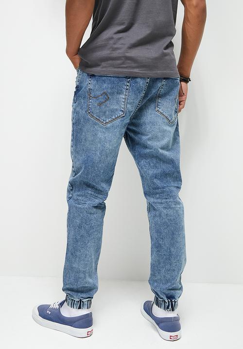 STYLE REPUBLIC - Gabe tapered fit cuff jeans - washed mid blue
