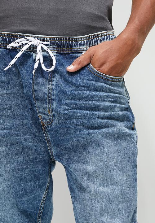 STYLE REPUBLIC - Gabe tapered fit cuff jeans - washed mid blue