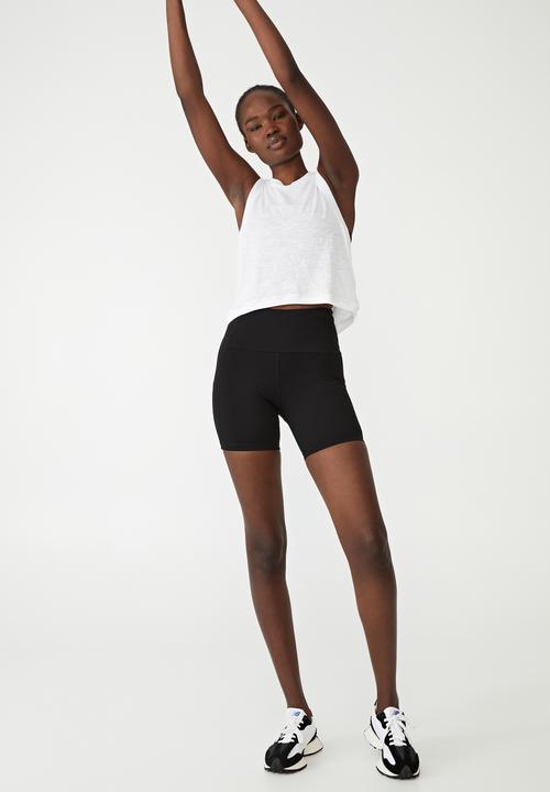 Cotton On - Compression mid length bike shorts - black