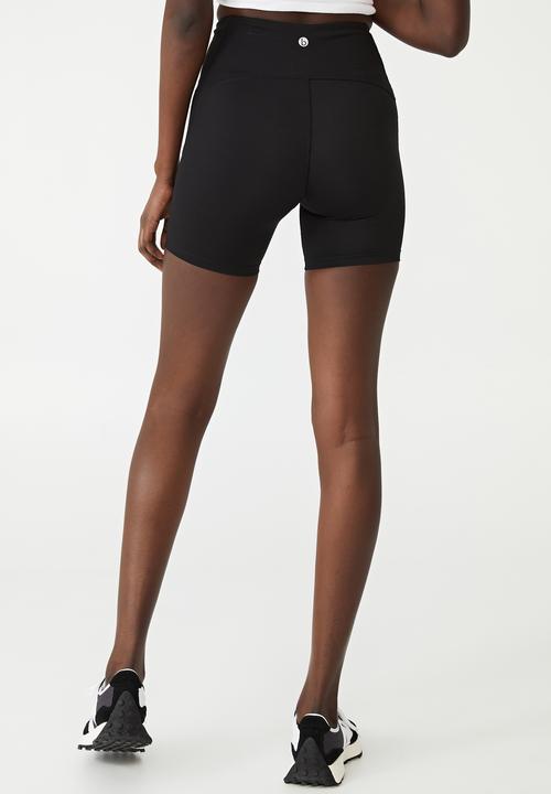 Cotton On - Compression mid length bike shorts - black