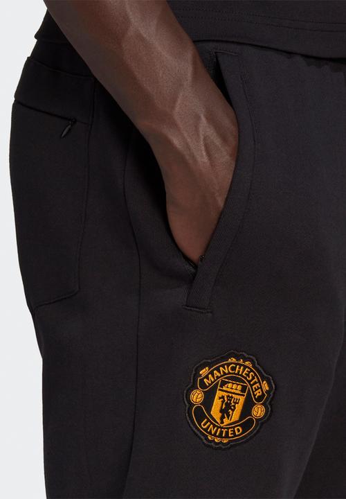 adidas Performance - MANCHESTER UNITED CNY TRACKSUIT BOTTOMS - black