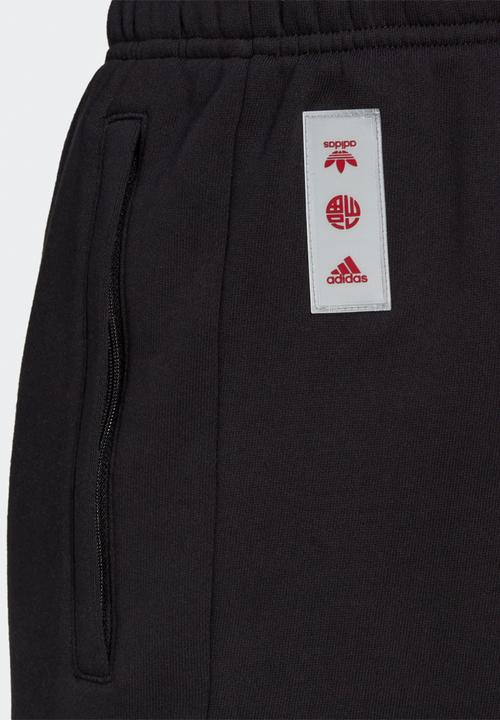 adidas Performance - MANCHESTER UNITED CNY TRACKSUIT BOTTOMS - black