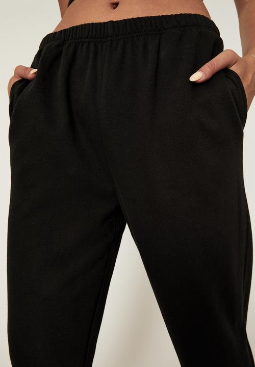 Supré  - 90s jogger track pant - black