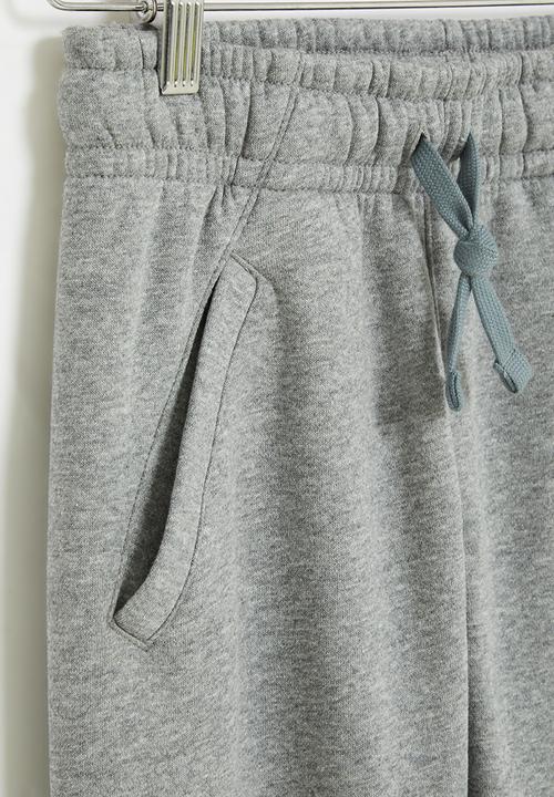 Nike - B nsw club hbr pant - carbon heather/smoke grey
