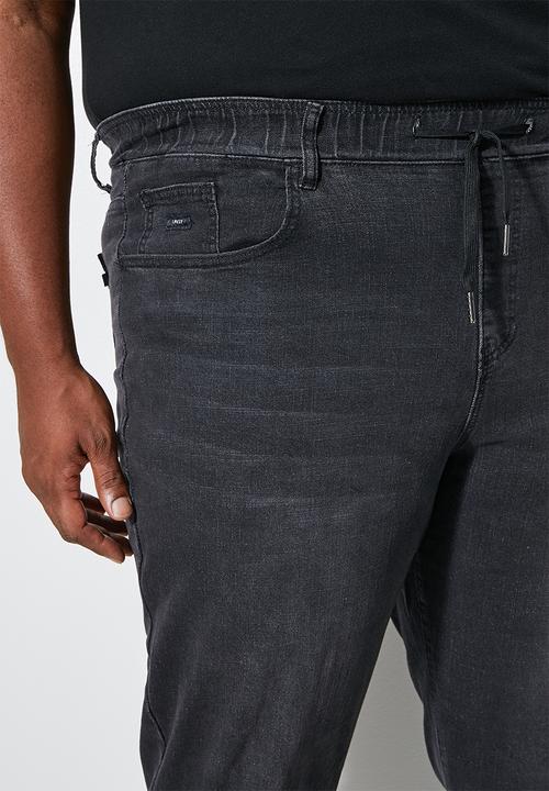 Superbalist - Blaze plus elastic waistband slim cuffed jeans - black rinse