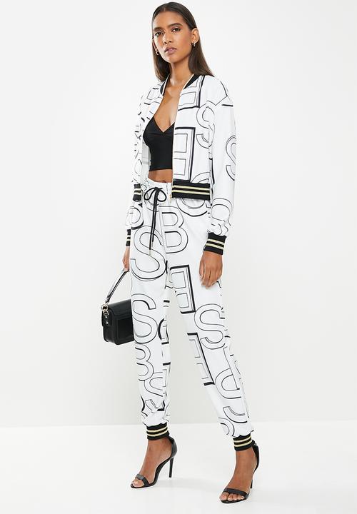 SISSY BOY - Branded trackpants - black & off white