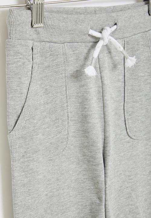MANGO - Trousers barna - grey