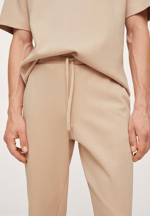 MANGO - Firosp Cotton jogger-style trouser  - light beige