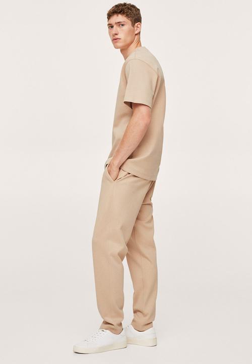 MANGO - Firosp Cotton jogger-style trouser  - light beige