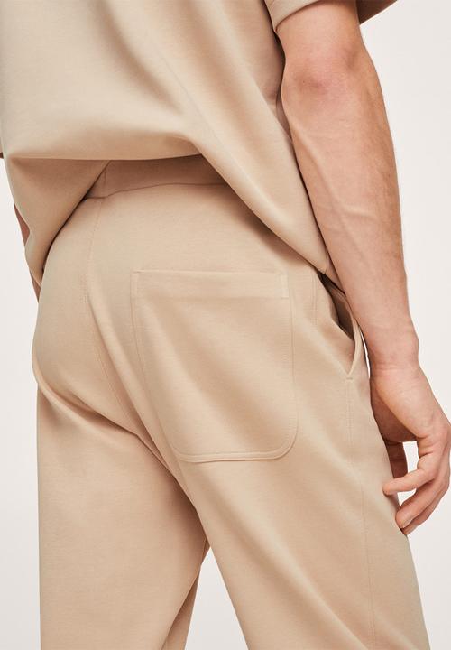 MANGO - Firosp Cotton jogger-style trouser  - light beige
