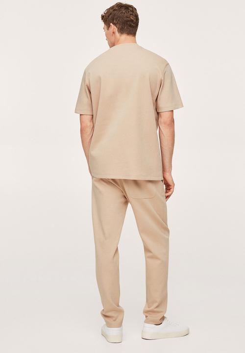 MANGO - Firosp Cotton jogger-style trouser  - light beige