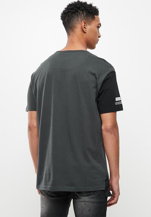 S.P.C.C - Demario relaxed fit side slit stepped hem, tape detail tee - charcoal