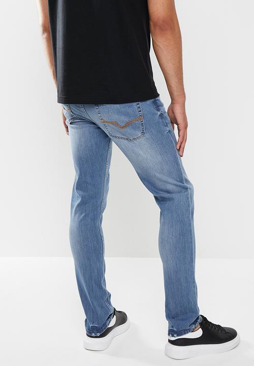 GUESS - Jackson slim fit tapered jeans - blue