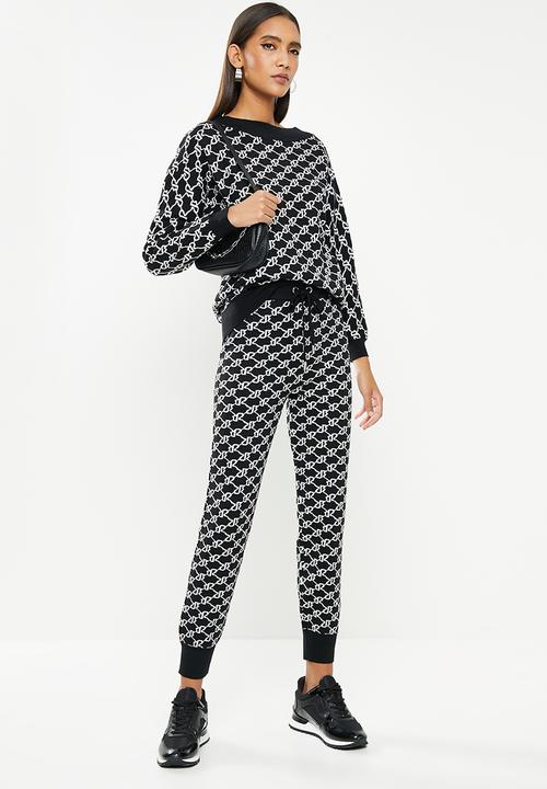 SISSY BOY - Assymmetric off the shoulder branded knit - black & off white