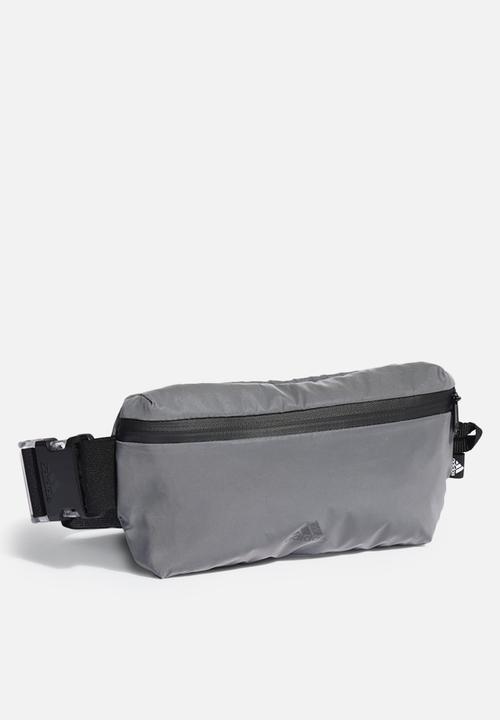 adidas Performance - Sports waistbag - reflective/black