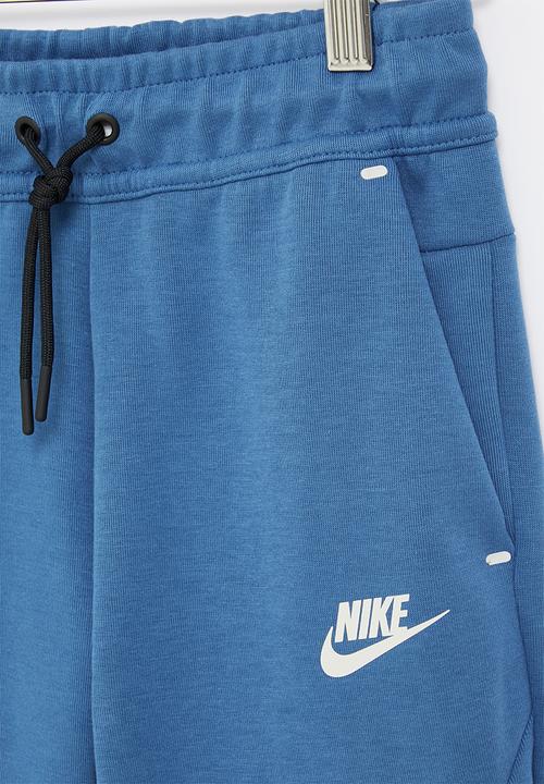 Nike - B nsw tch flc pant - dk marina blue & light bone