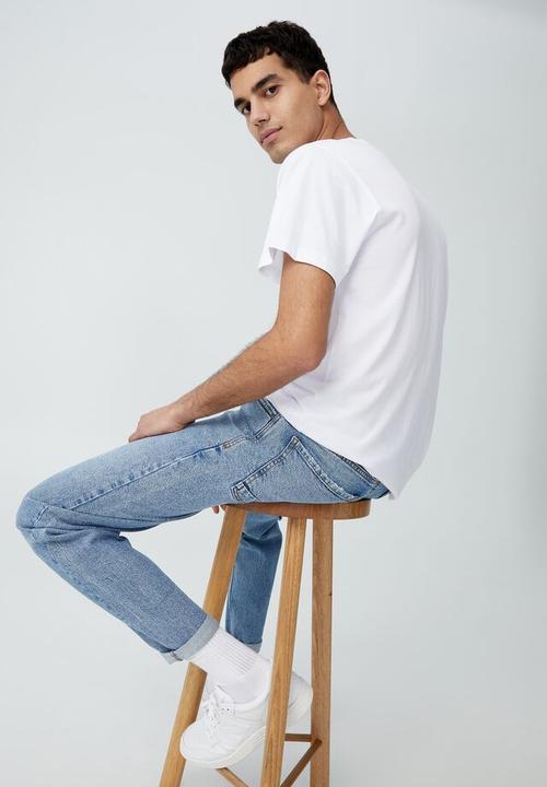 Cotton On - Relaxed tapered jean - mid blue