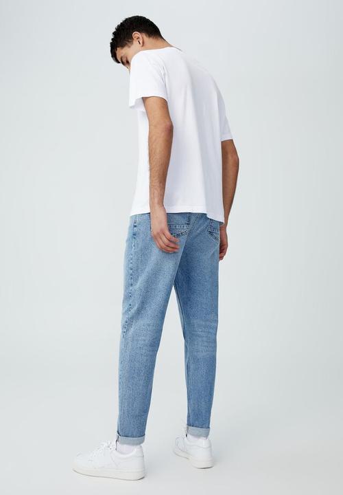 Cotton On - Relaxed tapered jean - mid blue