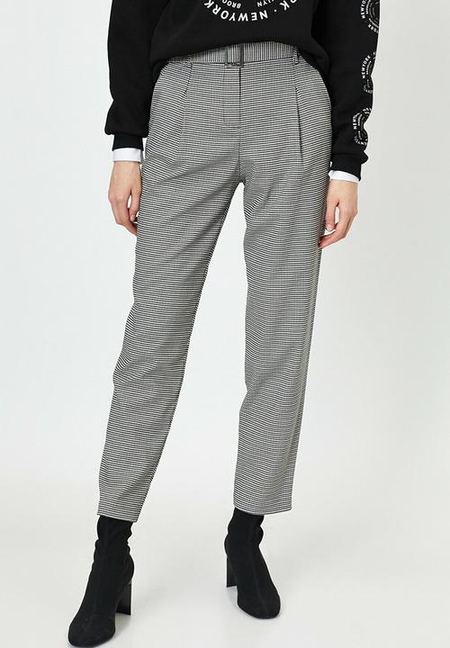 Koton - Medium rise pocket detailed check trousers - black patterned