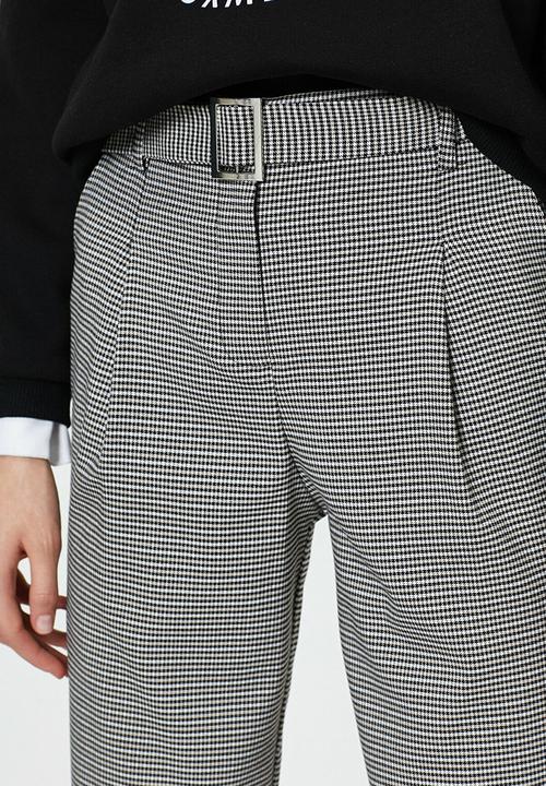 Koton - Medium rise pocket detailed check trousers - black patterned