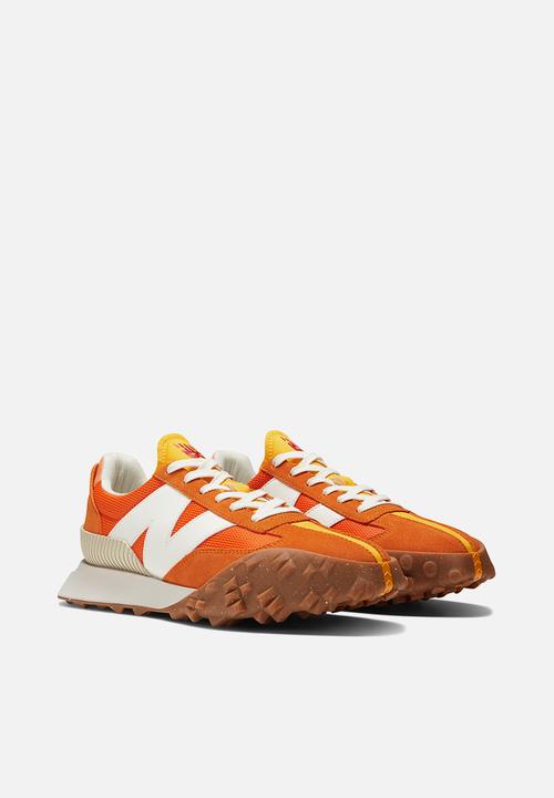 New Balance  - UXC72 v1 - vintage orange