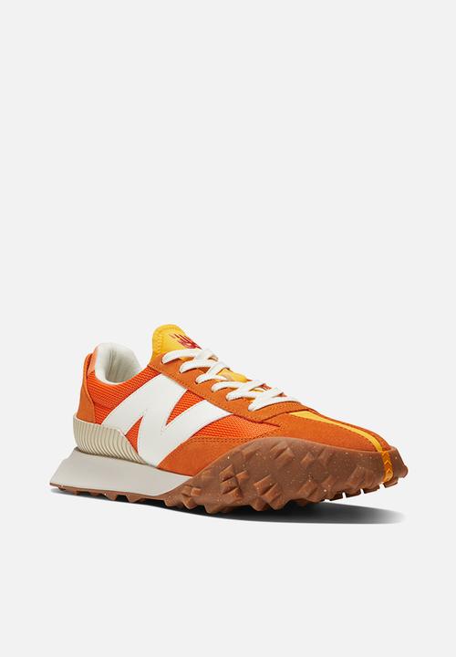 New Balance  - UXC72 v1 - vintage orange