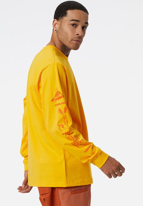 New Balance  - NB All Terrain Long Sleeve Tee- Sunflower